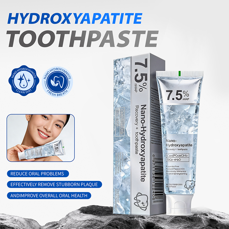 Hydroxyapatite toothpaste shown with its box and tube on a light gray background, featuring blue text and icons, a small inset photo of a smiling woman holding the tube, and marketing claims about reducing oral problems and plaque removal.